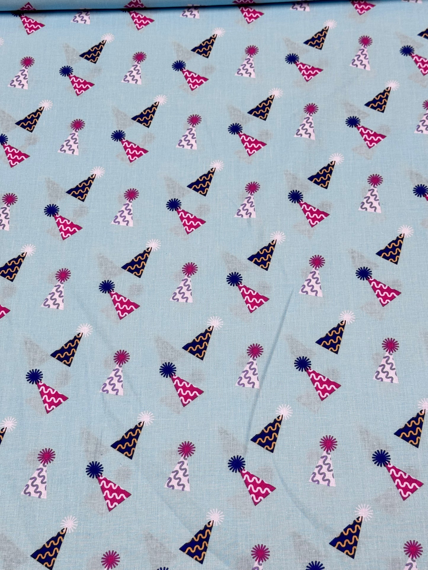 Unmarked CELEBRATION HATS on Blue Fabric