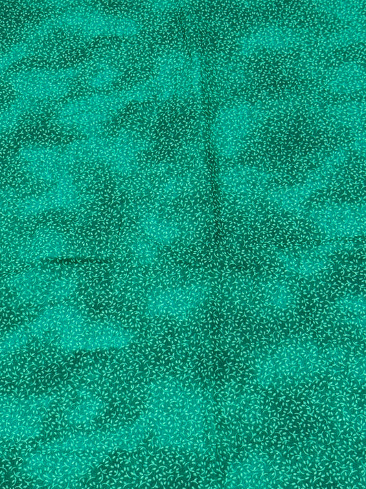 Bluish green fabric with design