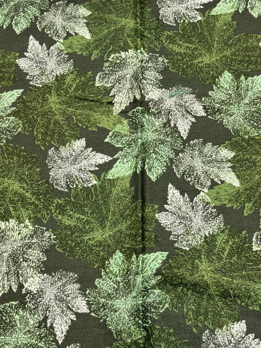 Greenish fabric with  maple leaves