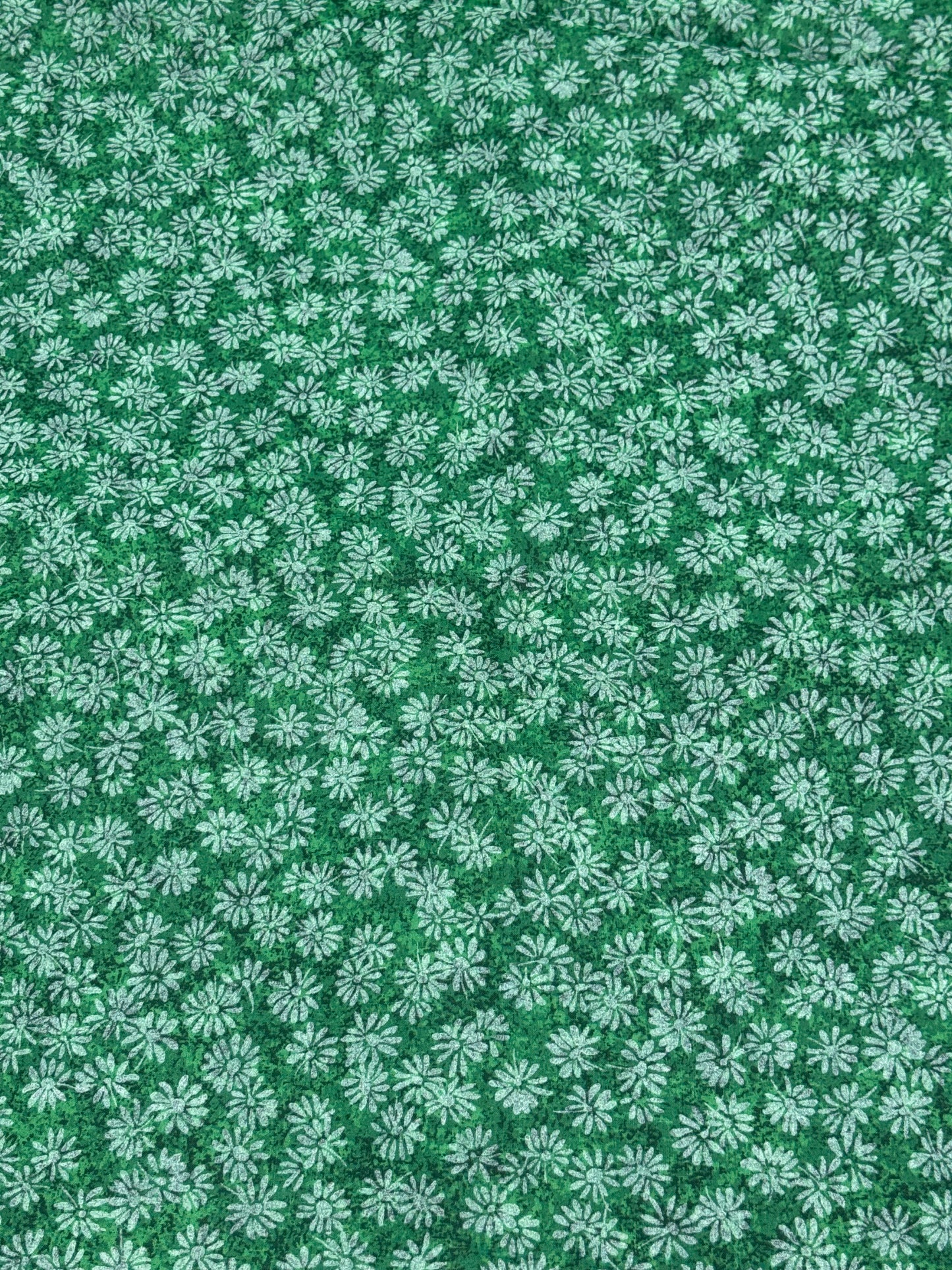 Greenish fabric with white small flowers